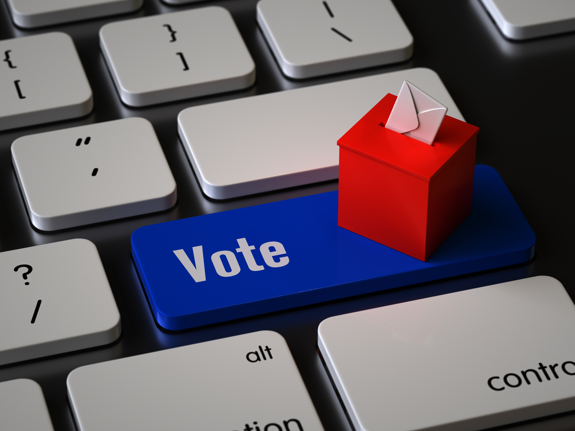 Urne rouge sur un clavier bleue écrit Vote